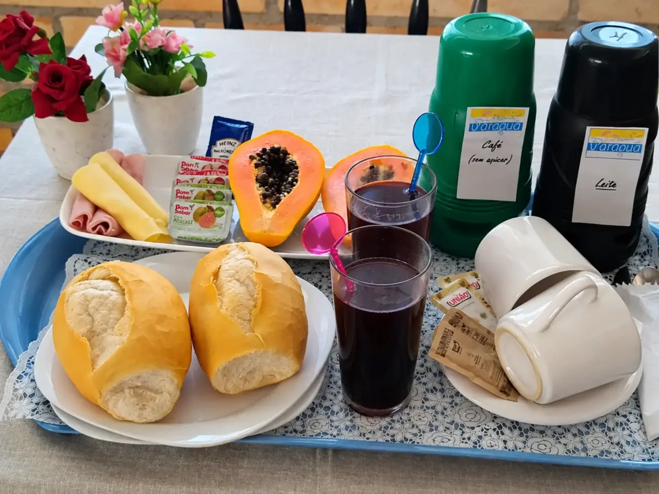 Breakfast buffet with fruit, juice, cheese and bread